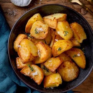 ROAST POTATOES (Served with sweetened kachumbari)
