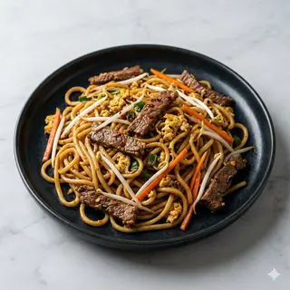 106 Spaghetti di riso saltati con manzo