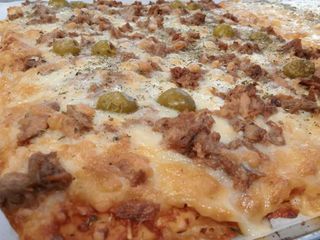 Pizza 4 quesos (porción)