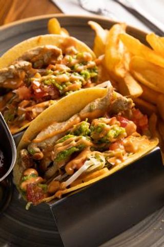 Tacos di pollo asado