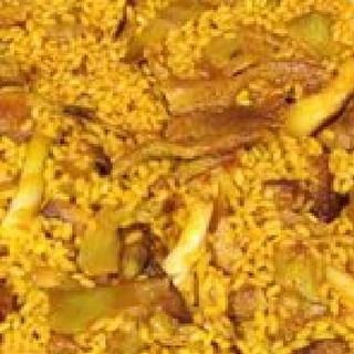 Arroz Con Secreto Ibérico Y Ajetes