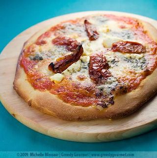 2 Pizza quattro formaggi Get 1 Free! (Monday & Tuesday ONLY)