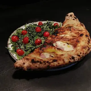 Calzone prosciutto e funghi (pieróg)