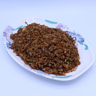 25. Arroz Frito Con Pato Y Salsa De Soja