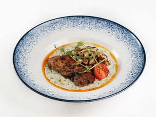 М'ясо індички в вершково-шпинатному соусі (270g)