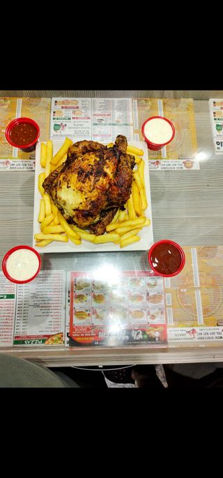 Pollo A L'Ast Entero Con Patatas