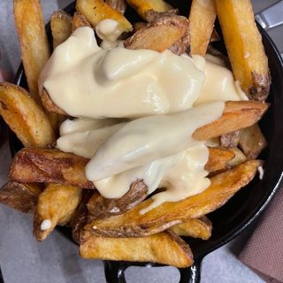 Patate fritte con fonduta