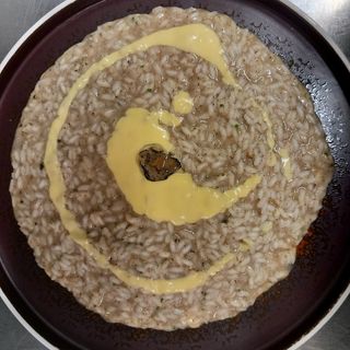 Tartufo scorzone nero e fonduta di Parmigiano Reggiano