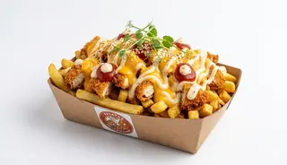 Patatas Con Pollo Empanado