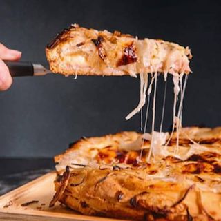 Porción Pizza Fugazzeta con Queso