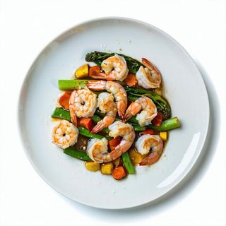 Gamberi saltati con verdure