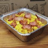 Фрі з сирним соусом та беконом 