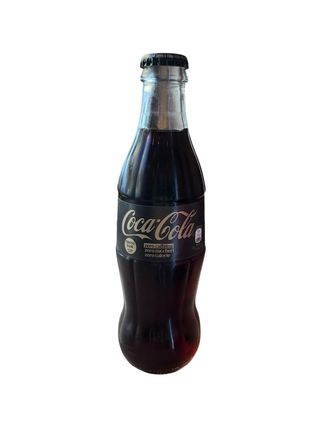 Coca-Cola Zero Zuccheri , Zero caffeina