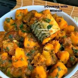 Delicious porridge yam and potatoes with fried chicken 