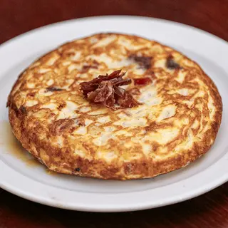 Truita de patates amb pernil de jabugo