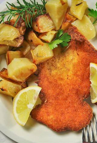 Cotoletta con patate al forno