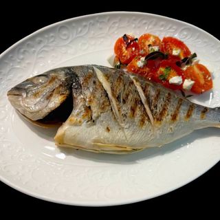 Дорадо с томатами 