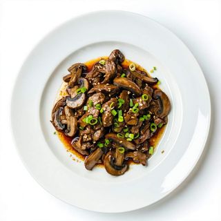 Carne De Tajima Salteado Con Setas Japonesas