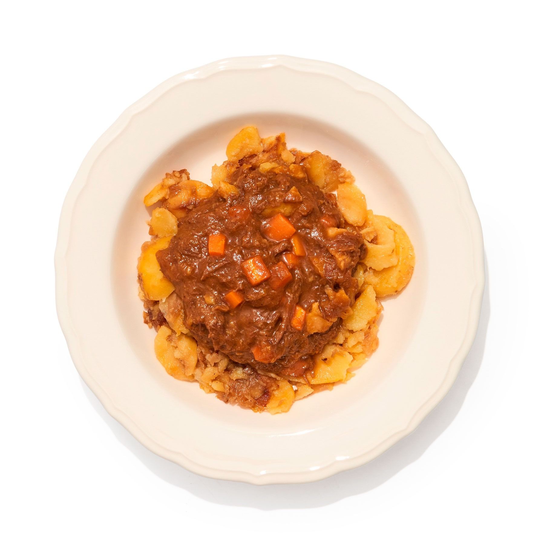 Rabo de toro desmigado caliente