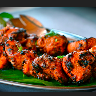 Pollo tikka con queso