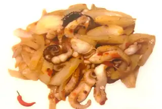 56. Pulpo al vapor picante