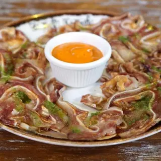 Ración De Láminas De Oreja A La Plancha