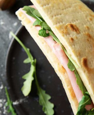 Piadina- Mortadella, squacquerone, rucola