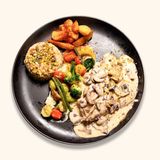 Suprême de poulet sauce champignons à la crème