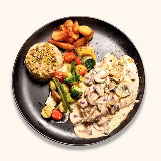Suprême de poulet sauce champignons à la crème