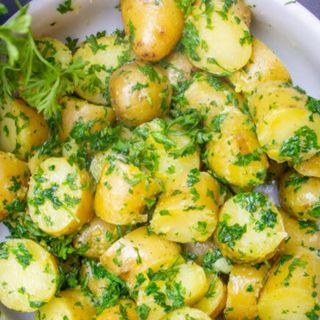 PARSLEY POTATOES (Served with sweetened kachumbari)