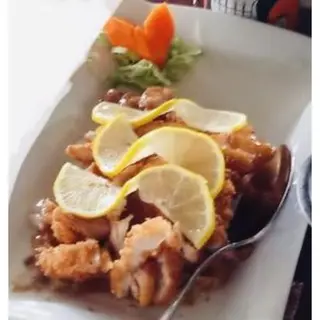 M27. Pollo Empanado Con Salsa Limón