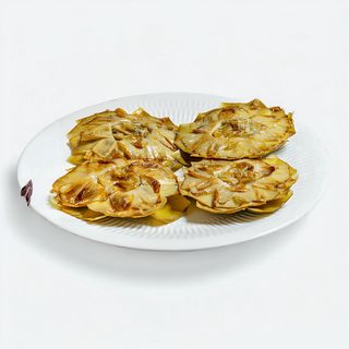 Alcachofas en flor a la parrilla con cristal de sal