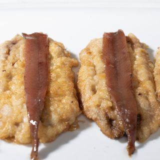 Bocartes albardados con anchoas (1 ud.)