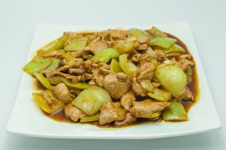 Carne de porc in sos curry