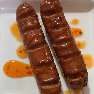 7A. Salchicha de China a la mano 1u