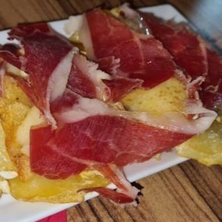 Revuelto De Patatas Y Jamón Ibérico (media ración)
