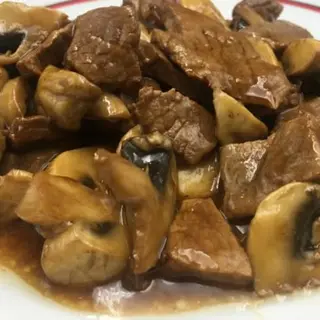 Ternera Con Champiñones