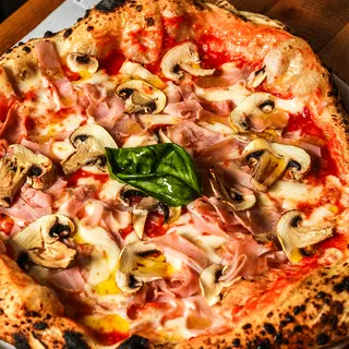 Pizza prosciutto e funghi 