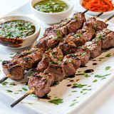 Roasted Stick + Onions, Tomatoes & Cassava