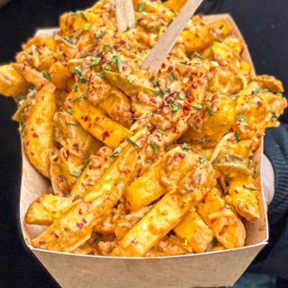 Patatas con salsa de queso 