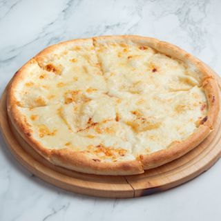 Пицца "Четыре сыра"