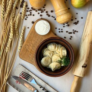 Пельмені зі свининою (подаються в бульйоні)