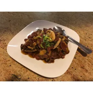 Ternera Con Champiñones