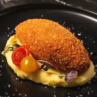 Pollo a la Kiev con puré de patatas