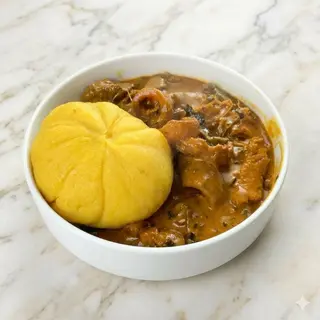 Egusi / Ogbono with Cowtail / Cowleg And Swallow
