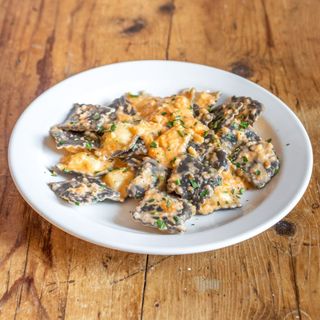 Ravioli di branzino alla crema di gamberi