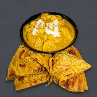 Coconut Fish Curry Served with 2 Chapatis