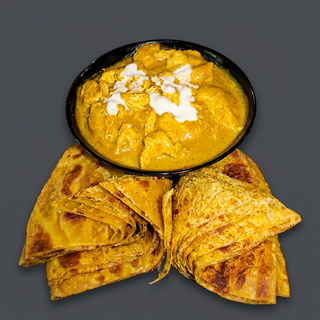 Coconut Fish Curry Served with 2 Chapatis