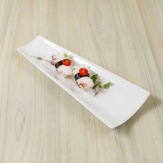 37. Nigiri tako (2 piezas)