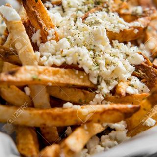 Ración De Patatas Fritas Con Queso cheddar